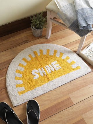 SHINE! Bath Mat - Handtufted - Holt x Palm -  Add some fun to your bathroom or bedroom with the SHINE Bath Mat! This cute mat will make you smile every time you step out of the shower or bed. Perfect for adding a touch of playfulness to your daily routine. (No exclamation points) Multi Material - Soft handspun Cotton Technique - Hand tufted. Style - Sunshine Product Dimensions - 20 X 30 Inches// 51 X 76 CM Wash Care - Mild wash.