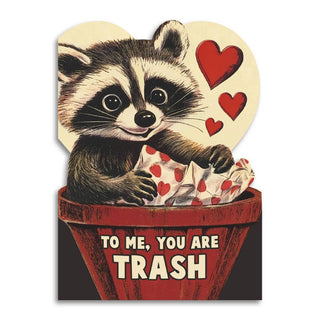 To Me, You Are Trash - Cute Raccoon Card - Holt x Palm -  Celebrate love this Valentine€™s Day with our "To Me, You Are Trash" card! Featuring a raccoon joyfully nestled in a waste bin, this card takes a playful jab at the traditional meanings of love and affection, transforming what sounds like an insult into a surprisingly sweet sentiment. €¢ Premium quality, soft touch cardstock €¢ Includes an A2 kraft envelope (4-3/8" x 5-3/4") €¢ Blank inside Each card is printed in the USA