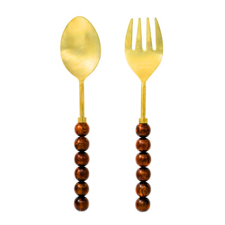 Serving Set with Brown Mid-Century Vibes - Holt x Palm -  Elevate your style with these salad servers adorned with resin spheres. They add a modern touch to your dining experience and are perfect for both indoor and outdoor use. Handmade Material: Resin & Stainless Steel Color: Brown & Gold Overall Dimension: Fork 11.31"L x 2.19"W x .75"H Spoon 11.43"L x 2.43"W x .75"H Dishwasher Safe Hand washing is recommended to ensure longevity