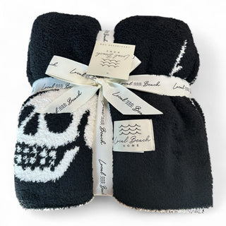 Skull & Bolt Luxe Home Blanket - Holt x Palm -  Introducing the Local Beach Home Collection featuring luxurious and incredibly cozy XL blankets. Reversible 100% Feather Knit construction with an ultra soft hand. Perfect for home, travel, and beyond. Cozy up and stay warm with the softest blanket ever. White Front // Black Back €¢ 100% Polyester Microfiber XL Blanket, Double layer 54" W x 72" L No fading, shed free Care: Machine Wash Cold, Gentle Cycle. Air or tumble dry low
