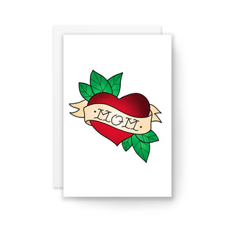 Mom Tatt Card - Holt x Palm -  Celebrate your "cool mom" this Mother's Day with our Mom Tatt Card! Show her how much you appreciate her unique and playful style with this quirky and fun card. Perfect for moms who don't take themselves too seriously. (Limit 2 exclamation points.) DETAILS: - Each card is originally drawn, designed and/or illustrated. - Card measures 4€� x 6€� on smooth matte white card stock. - Blank Inside. - Envelope included, packaged in sleeve