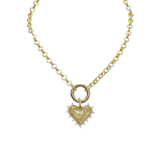 The "Carrie" Sparkly x Spikey Heart Necklace - Holt x Palm -  If it's good enough for SJP, it's got to be cute! A chunky chain with large clasp at the heart which opens to add extra charms if you like. Looks great layered!! Perfect Valentine's gift for you or someone special.Wear your heart on your sleeve - and your Sarah's Diamond Style Heart Necklace around your neck! This super-sweet 16 or 18" necklace features a beautiful gold heart outlined with round crystals, giving off a sparkle you can't deny.