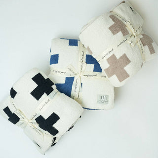 Cross Luxe Home Blanket - Holt x Palm -  Introducing the Local Beach Home Collection featuring luxurious and incredibly cozy XL blankets. Reversible 100% Feather Knit construction with an ultra soft hand. Perfect for home, travel, and beyond. Cozy up and stay warm with the softest blanket ever. Reversible =Top side is light color, bottom side is dark color • 100% Polyester Microfiber • XL Blanket, Double layer 54" W x 72" L • No fading, shed free Care: Machine Wash Cold, Gentle Cycle. Air or tumble dry low