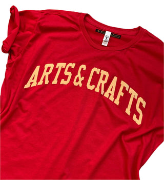 Arts & Crafts -Ladies Tee - Holt x Palm -  I don't know what's going on with the local sports team, but if you want to chat about hot glue guns or paint opacity, I'm your gal. Finally, a shirt that reps my team, the arts & crafts squad! Soft and slouchy. Oversized fit, size down if you want a more fitted look. Red shirt/cream text. Fabric: lightweight cotton poly jersey 60% combed ring-spun cotton 40% polyester 4.0 Oz neck: crew drop tail with curved front and back hem. Generous cut for a loose fit.