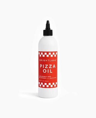 Pizza Oil - Holt x Palm -  Step up your pizza game with this DELICIOUS hot and herbaceous oil made with premium cold-pressed California Extra Virgin Olive Oil and flavored with herbs and spices to your tastebuds€™ delight. You won't want pizza any other way after you add this one. Who needs ranch when you have this amazing pizza oil. 🍕 Details: 12 Oz Bottle Jalapeno and Herb Favored Olive Oil Made with simple ingredients Non-GMO Great on bread, eggs, or anything you want to add a kick too