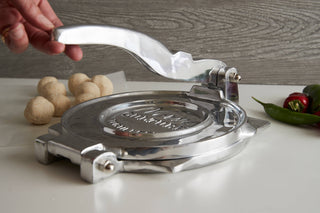 Large Tortilla Press - Holt x Palm -  This aluminum tortilla press is hand polished for a counter-ready look. The 8.5€™€™ diameter makes it perfect for recipes calling for larger tortillas like quesadillas, enchiladas, and more. Comes with three taco recipes, and instructions to make the perfect corn tortilla using only masa flour and water.